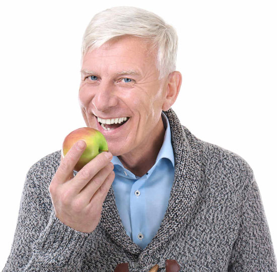 Apple Dentistry - Senior Eating Apple